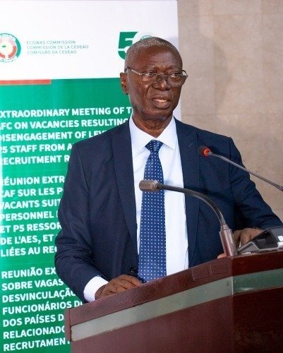 His Excellency Dr. Julius F. Sandy